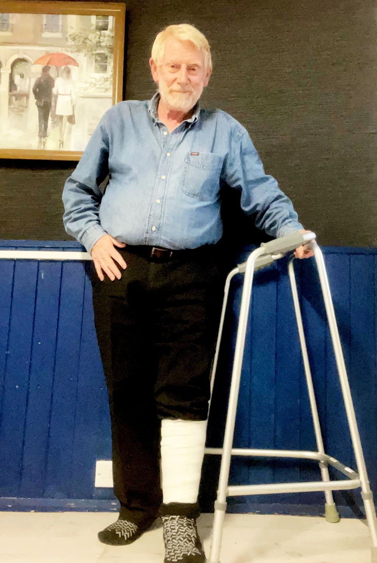 Glenn still has to use a Zimmer frame because of his injuries